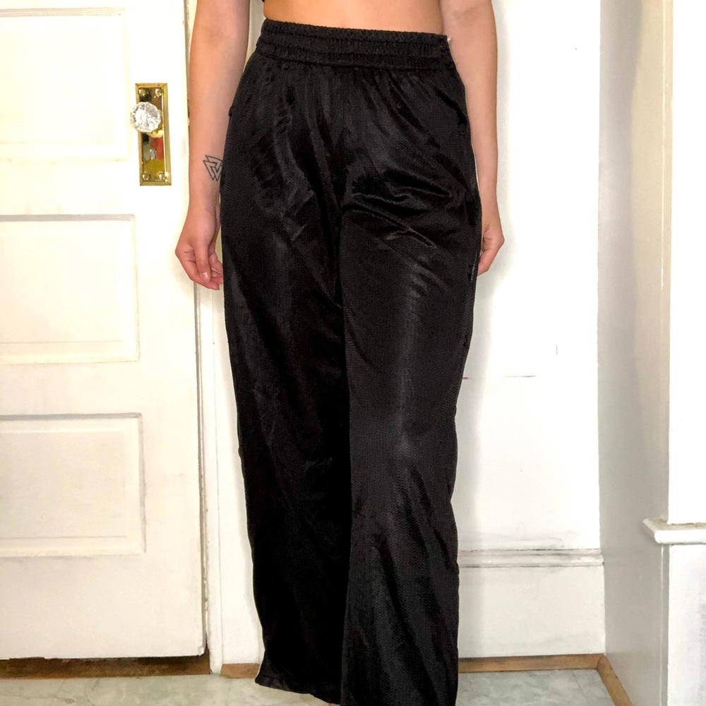 Black break away pants with white strip